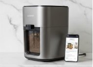 Smart electric composter with mobile app connectivity on a kitchen counter